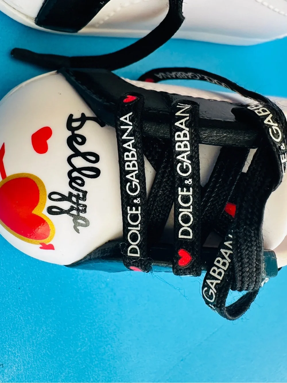Dolce & Gabbana Doll White Sneakers with Black Laces and Red Heart Accents